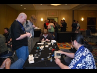 Lockpickers of various skill levels attempt to conquer all the practice locks in preparation for the lockpicking contes.